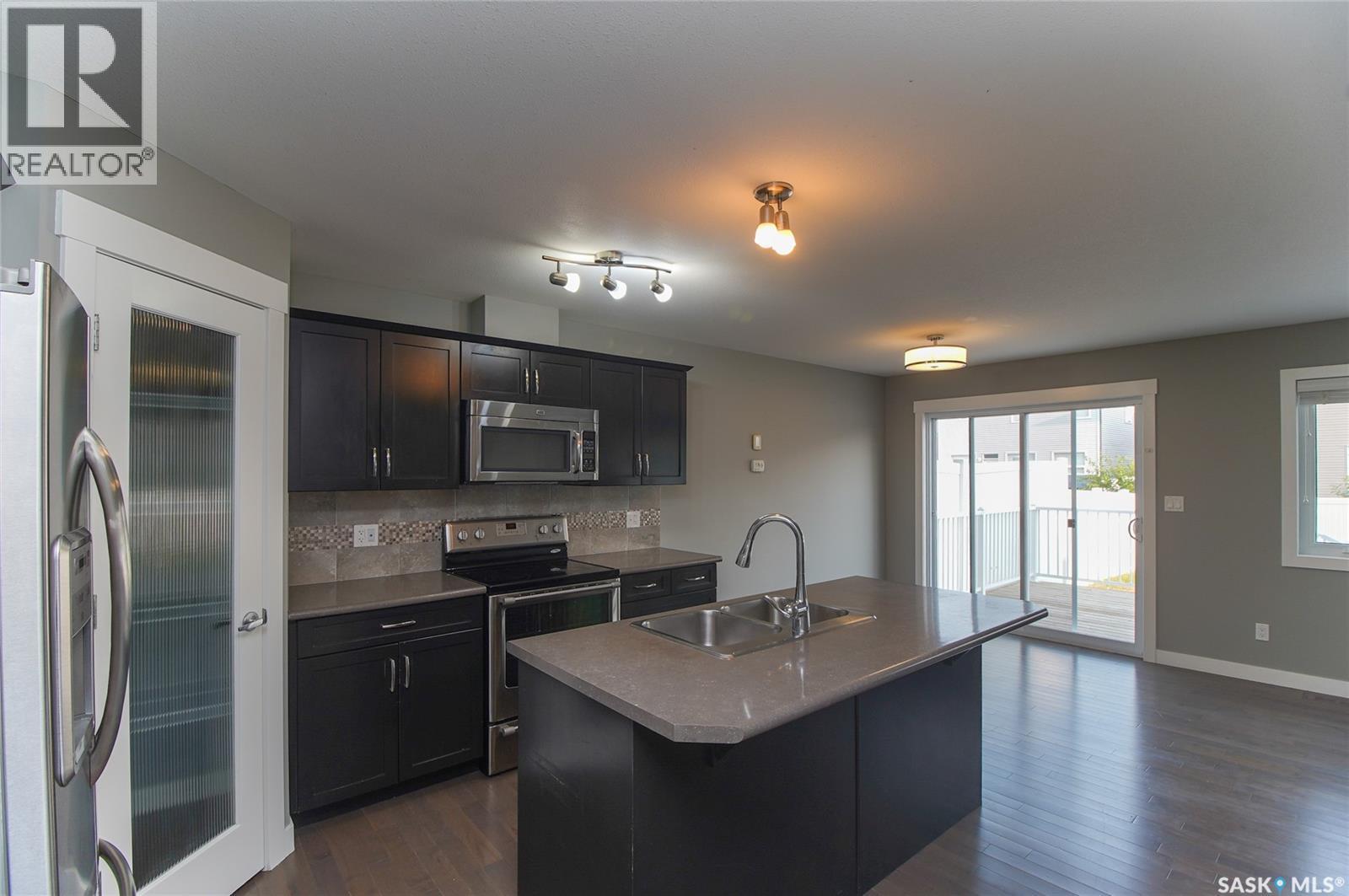 4541 Green Rock Road, Regina, SK - Indoor Photo Showing Kitchen With Stainless Steel Kitchen With Double Sink With Upgraded Kitchen