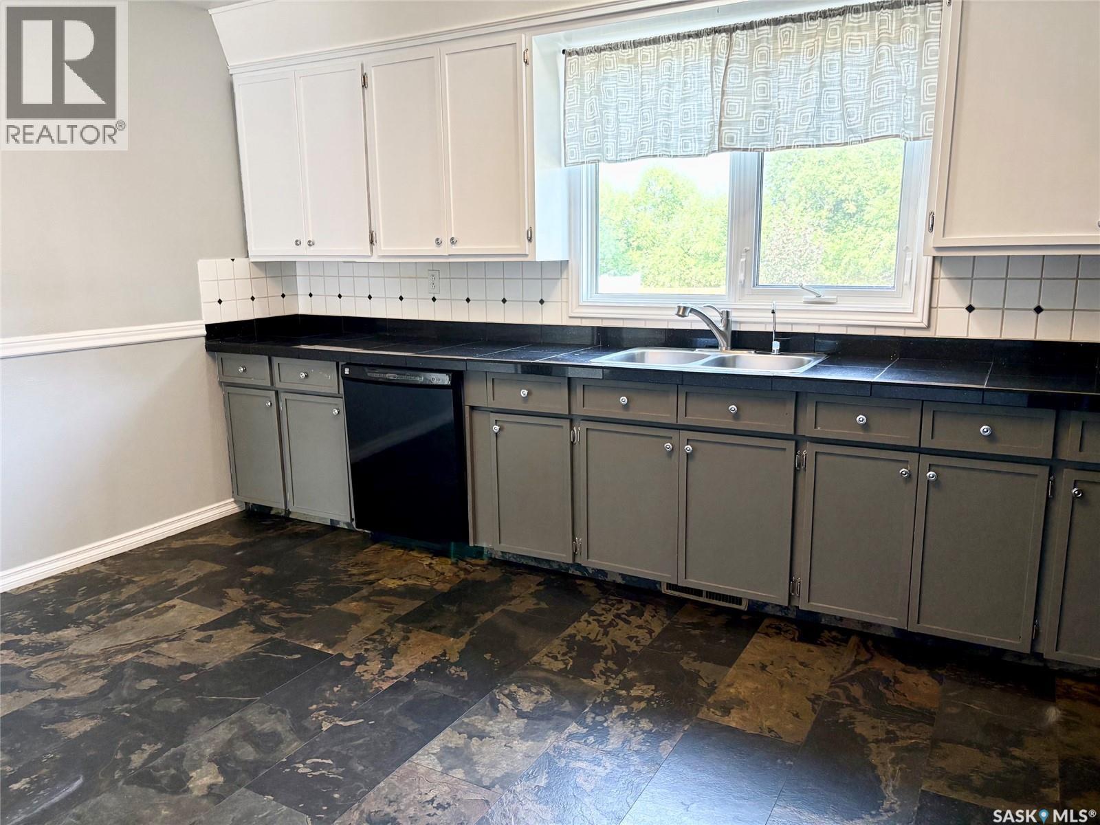 62 Canwood Crescent, Yorkton, SK - Indoor Photo Showing Kitchen With Double Sink
