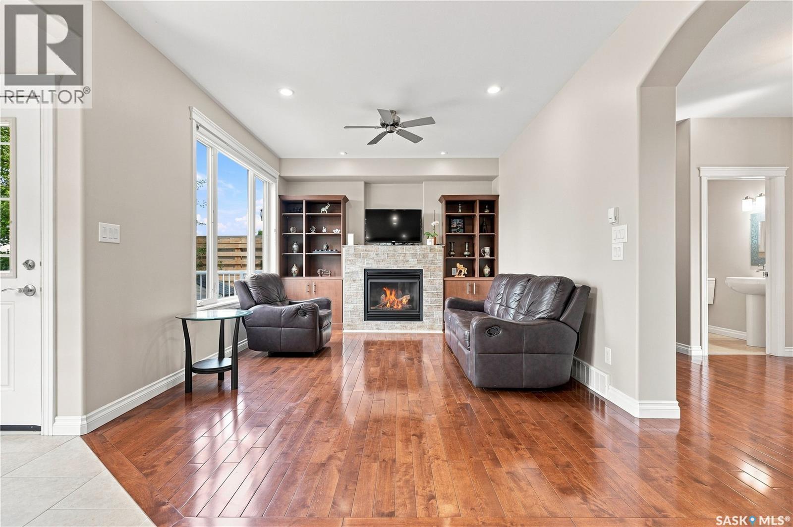315 Waters Crescent, Saskatoon, SK - Indoor Photo Showing Living Room With Fireplace