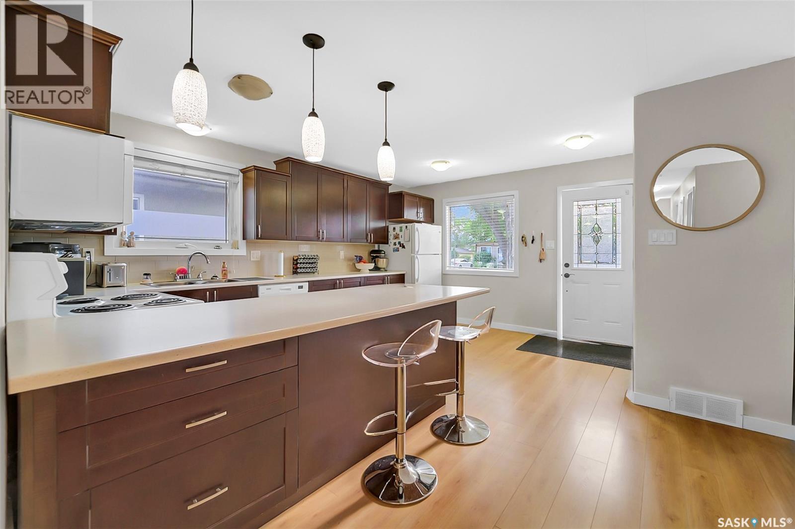 13 Carleton Drive, Saskatoon, SK - Indoor Photo Showing Kitchen With Double Sink