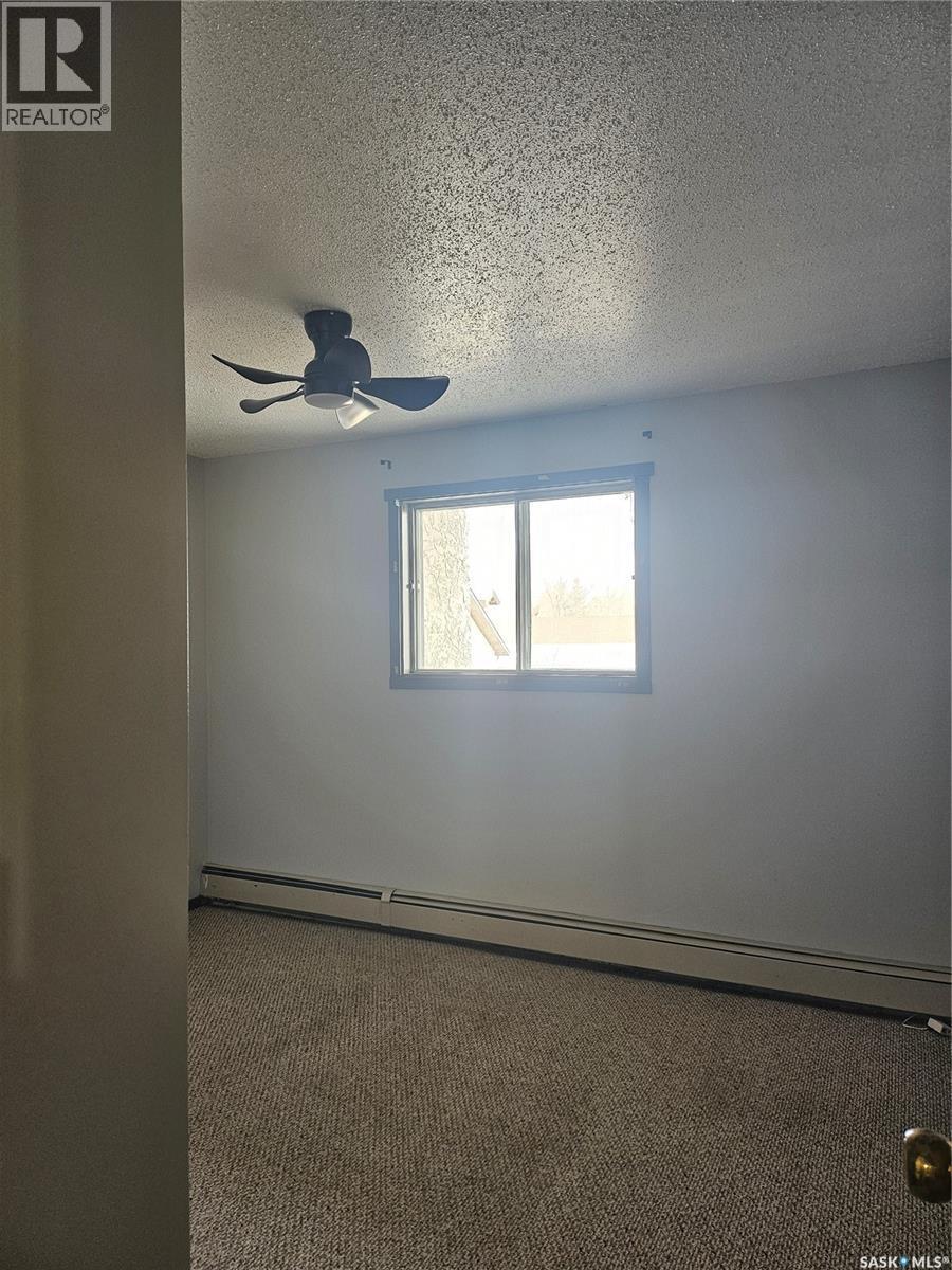 205 306 Perkins Street, Estevan, SK - Indoor Photo Showing Other Room