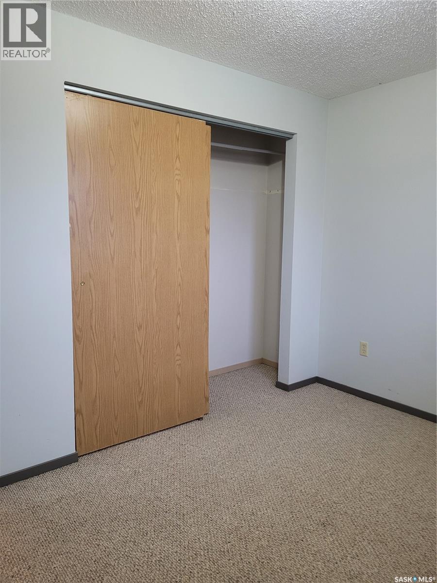 205 306 Perkins Street, Estevan, SK - Indoor Photo Showing Other Room