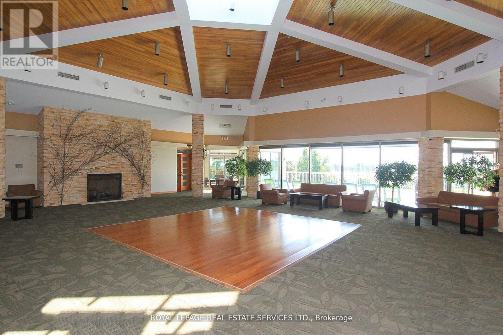 1010 - 2261 Lake Shore Boulevard W, Toronto, ON - Indoor Photo Showing Other Room With Fireplace