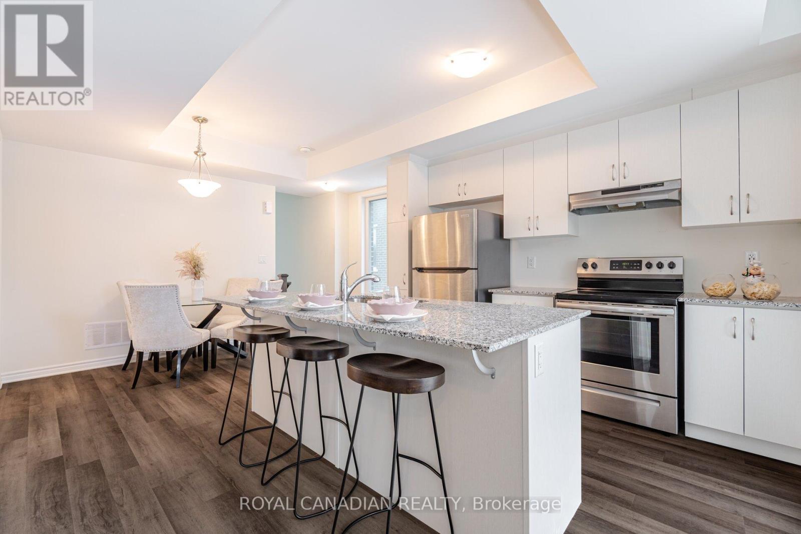 401 - 1034 Reflection Place, Pickering, ON - Indoor Photo Showing Kitchen With Stainless Steel Kitchen With Upgraded Kitchen