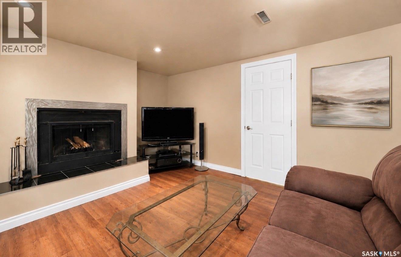 1201 Spadina Crescent W, Saskatoon, SK - Indoor Photo Showing Living Room With Fireplace