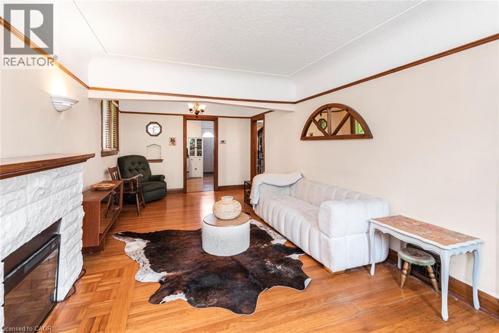 52 Cameron Avenue S, Hamilton, ON - Indoor With Fireplace