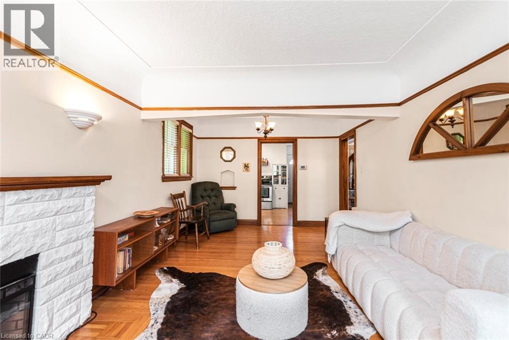 52 Cameron Avenue S, Hamilton, ON - Indoor Photo Showing Living Room With Fireplace