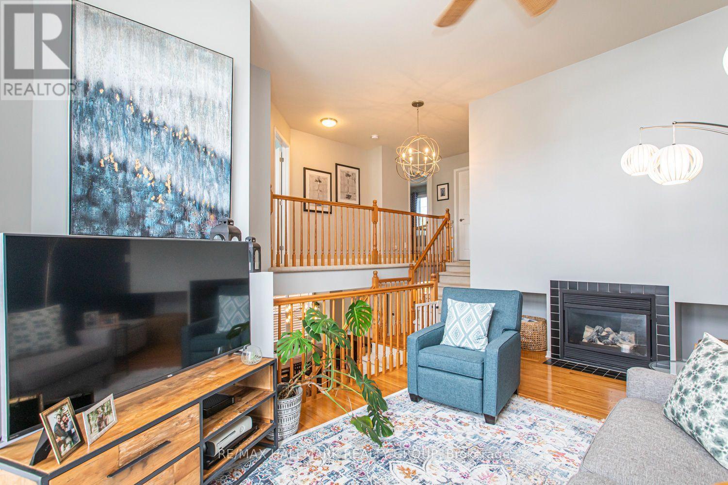 55 Jardin Private, Ottawa, ON - Indoor Photo Showing Living Room With Fireplace