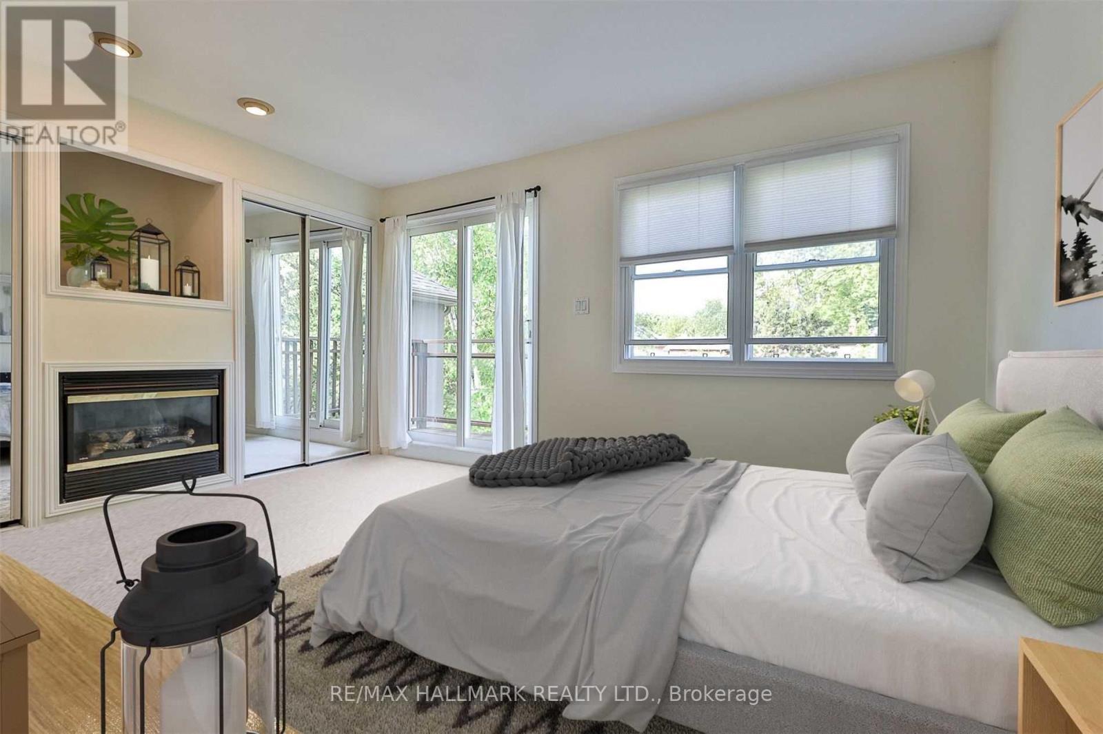 100 Courcelette Road, Toronto, ON - Indoor Photo Showing Bedroom With Fireplace