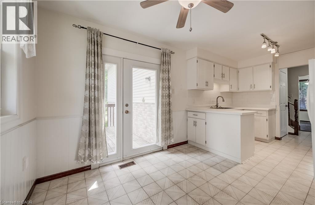 Walk-out to private deck. - 197 Southwood Drive, Kitchener, ON - Indoor Photo Showing Kitchen
