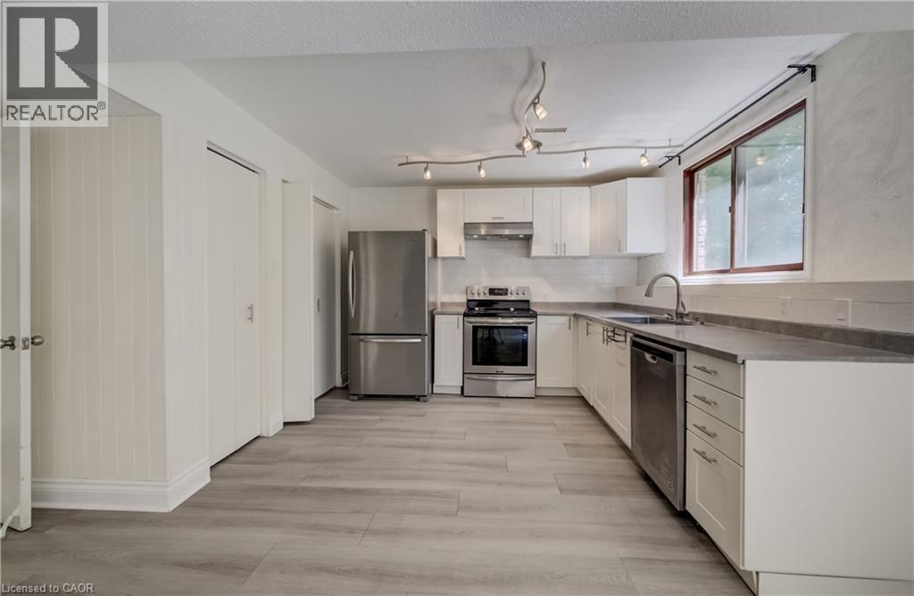 Modern cabinetry and appliances. - 197 Southwood Drive, Kitchener, ON - Indoor Photo Showing Kitchen