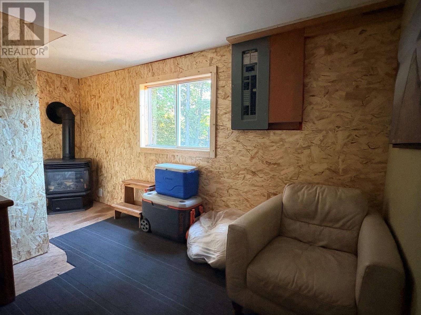 3235 Walnut St, Hilton Beach, ON - Indoor Photo Showing Living Room With Fireplace