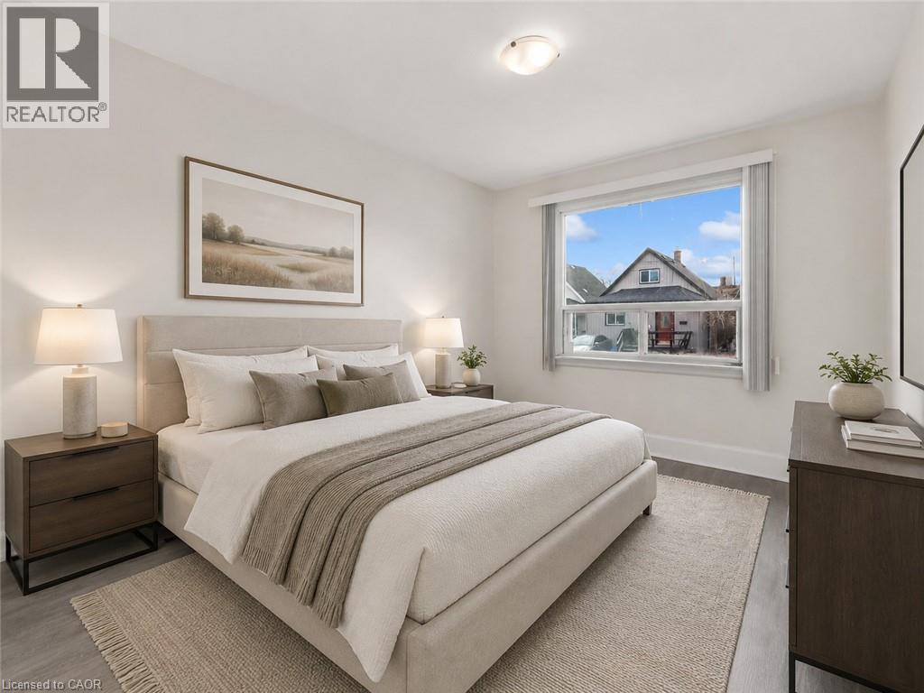 Virtually Staged Bedroom 1 - 29 Harrison Avenue, Hamilton, ON - Indoor Photo Showing Bedroom