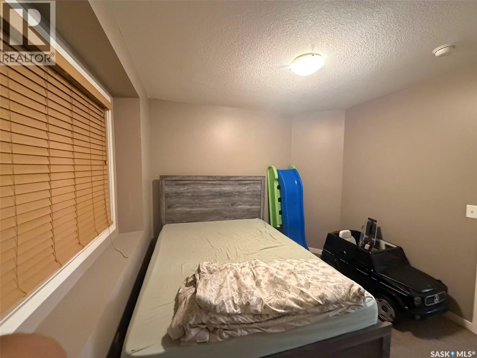 26 5742 Gordon Road, Regina, SK - Indoor Photo Showing Bedroom