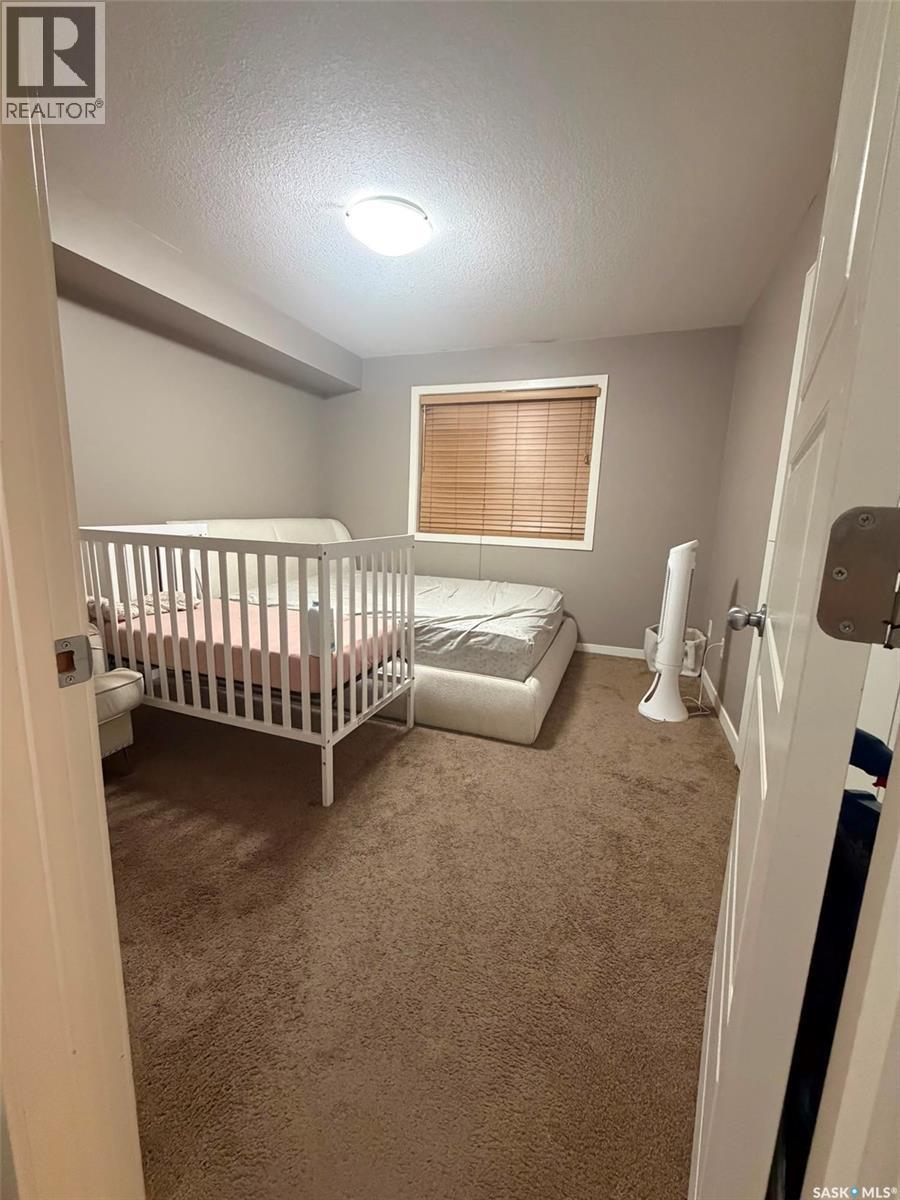 26 5742 Gordon Road, Regina, SK - Indoor Photo Showing Bedroom