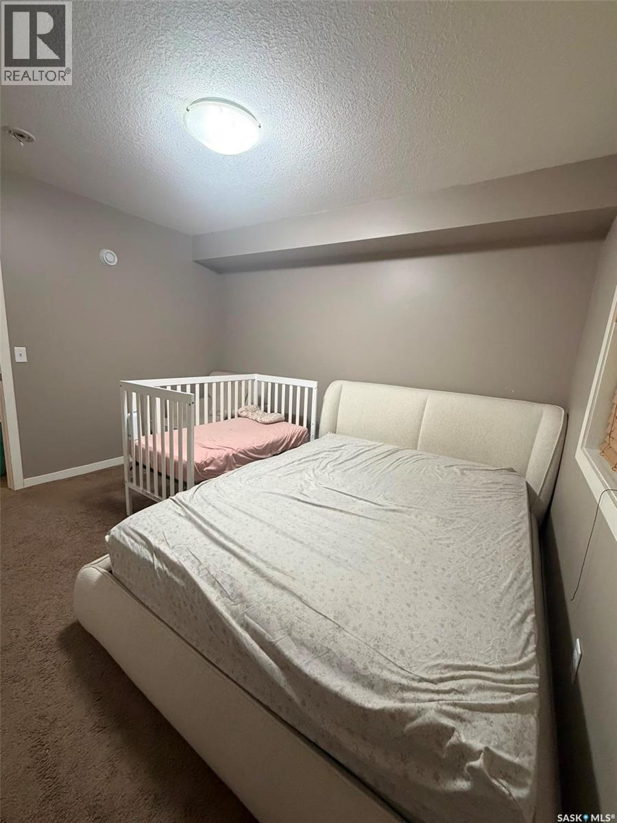 26 5742 Gordon Road, Regina, SK - Indoor Photo Showing Bedroom