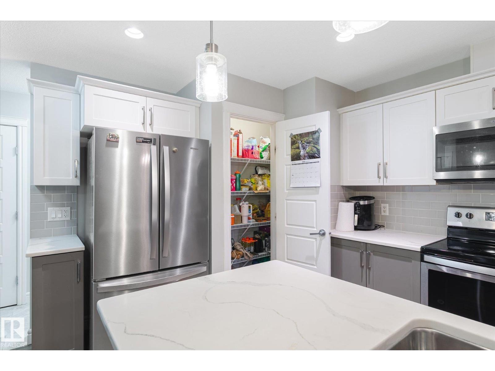 1416 169 St Sw, Edmonton, AB - Indoor Photo Showing Kitchen With Stainless Steel Kitchen