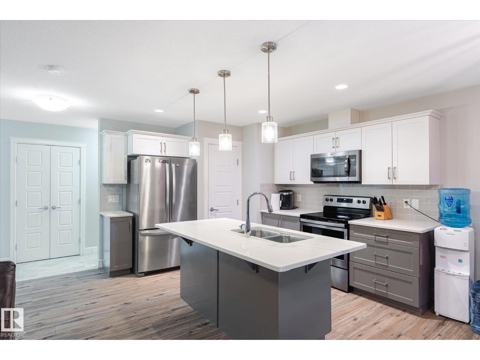 1416 169 St Sw, Edmonton, AB - Indoor Photo Showing Kitchen With Stainless Steel Kitchen With Double Sink With Upgraded Kitchen