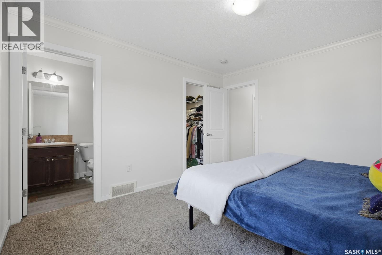 70 235 Rosewood Boulevard E, Saskatoon, SK - Indoor Photo Showing Bedroom