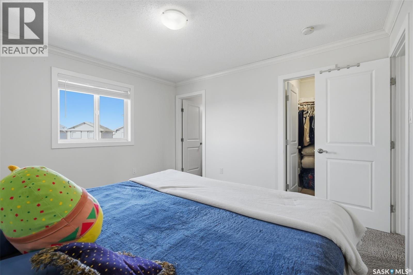70 235 Rosewood Boulevard E, Saskatoon, SK - Indoor Photo Showing Bedroom