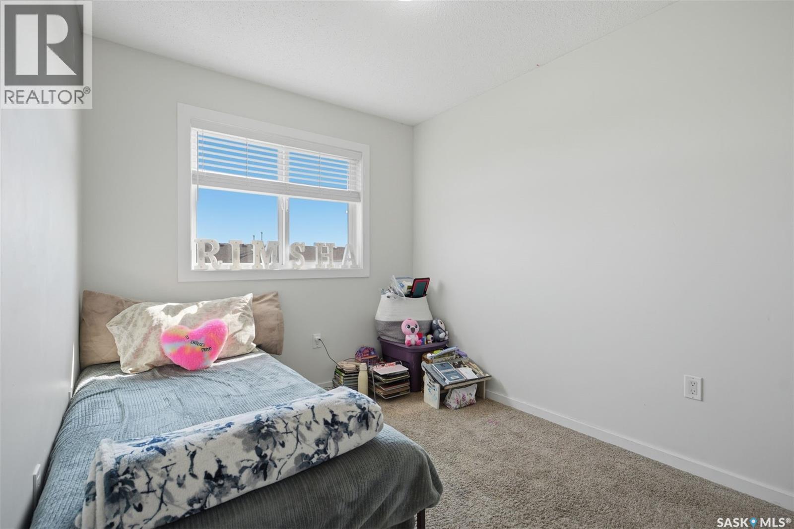 70 235 Rosewood Boulevard E, Saskatoon, SK - Indoor Photo Showing Bedroom