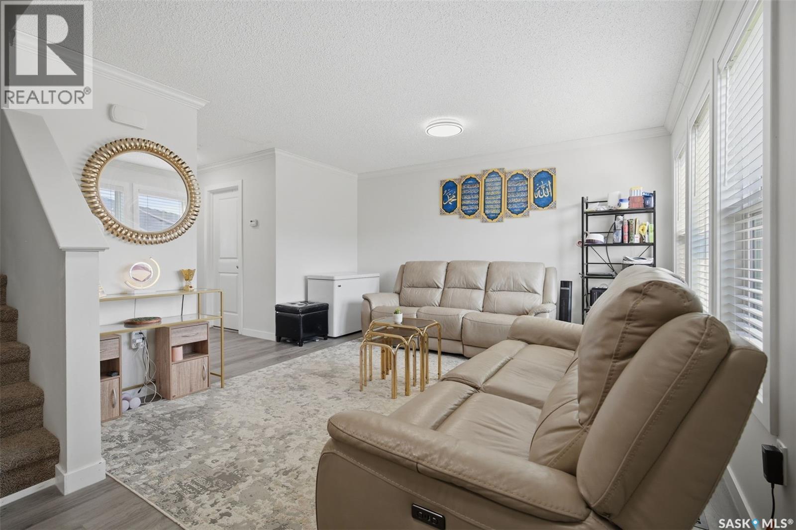 70 235 Rosewood Boulevard E, Saskatoon, SK - Indoor Photo Showing Living Room