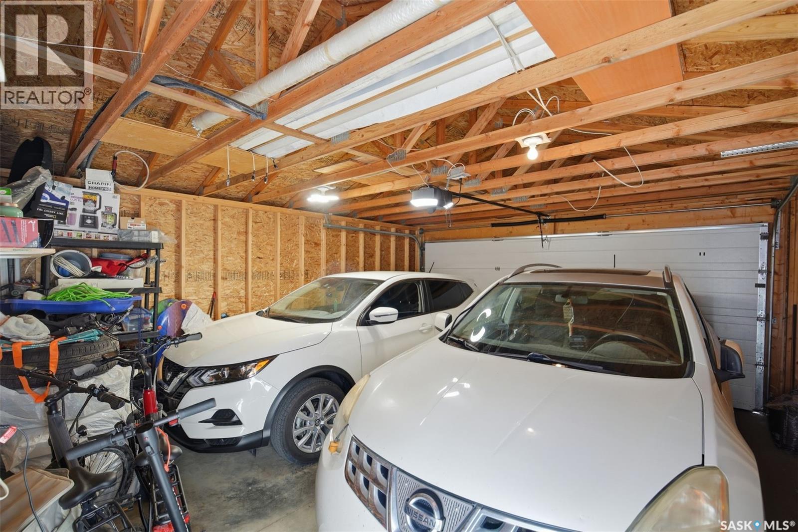 70 235 Rosewood Boulevard E, Saskatoon, SK - Indoor Photo Showing Garage