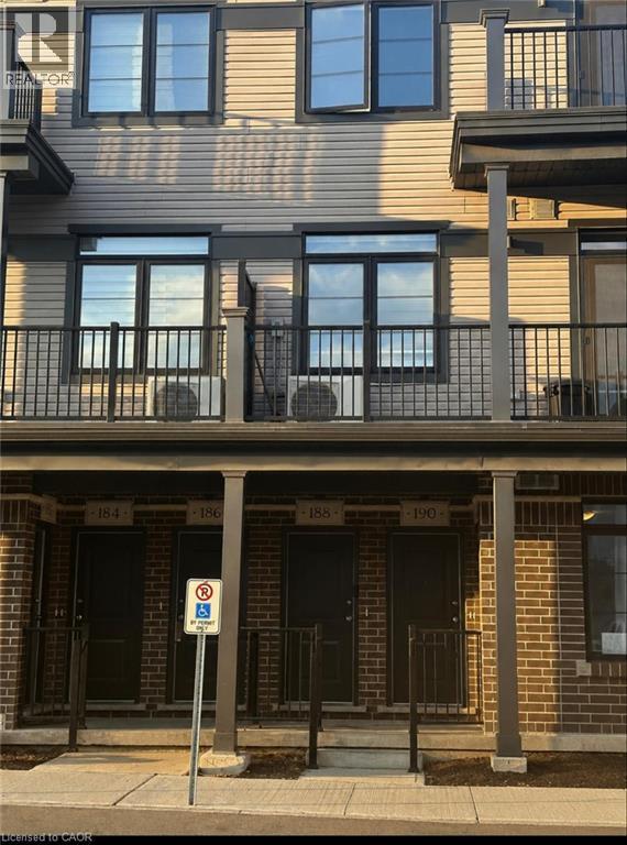 Contemporary multi-level exterior featuring brick and horizontal siding - 188 Wheat Lane E, Kitchener, ON - Outdoor With Balcony With Deck Patio Veranda