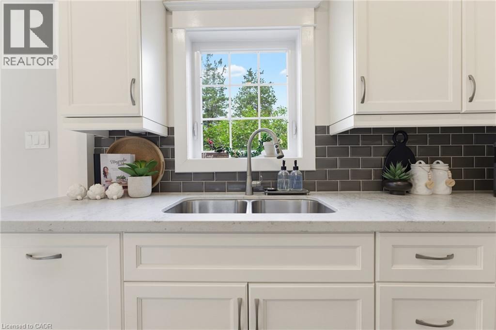 394 Charlton Avenue W, Hamilton, ON - Indoor Photo Showing Kitchen With Double Sink