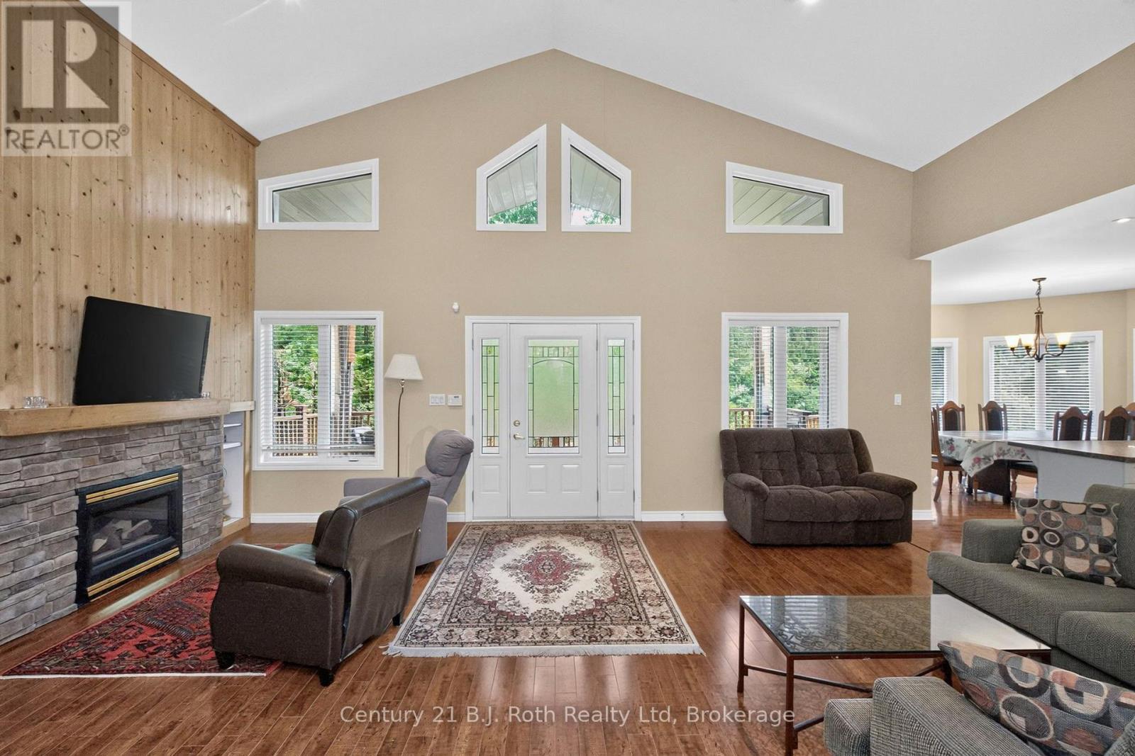 11 Rue Karola Road, Tiny, ON - Indoor Photo Showing Living Room With Fireplace