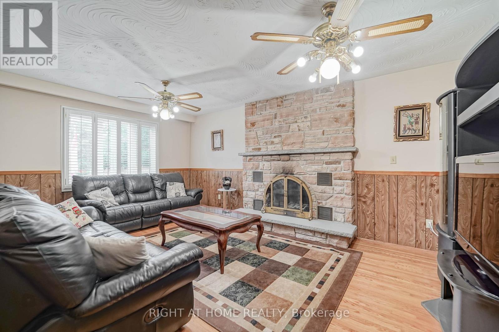 2 Lapworth Crescent, Toronto, ON - Indoor Photo Showing Living Room With Fireplace