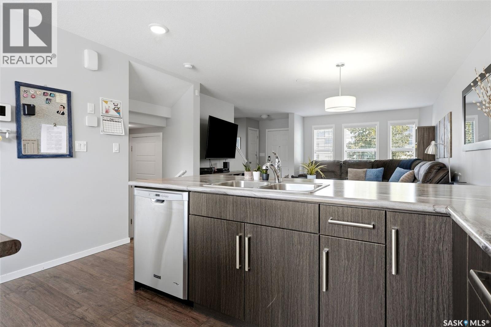 5740 Glide Crescent, Regina, SK - Indoor Photo Showing Kitchen With Double Sink