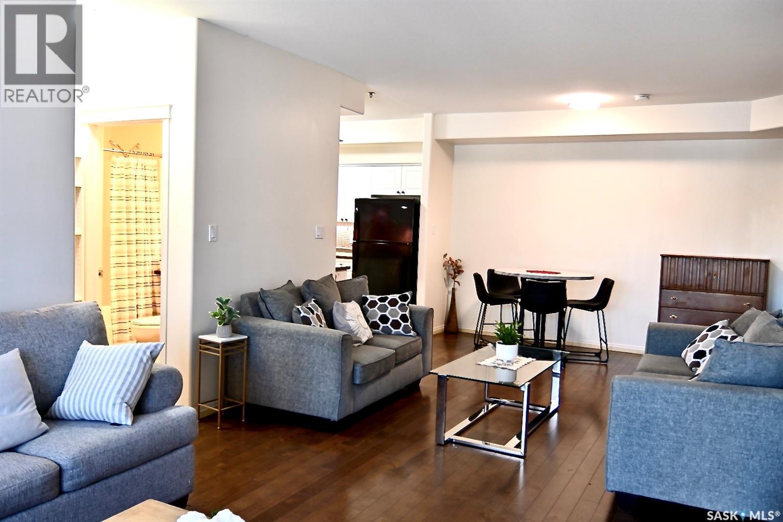 106 110 Armistice Way, Saskatoon, SK - Indoor Photo Showing Living Room