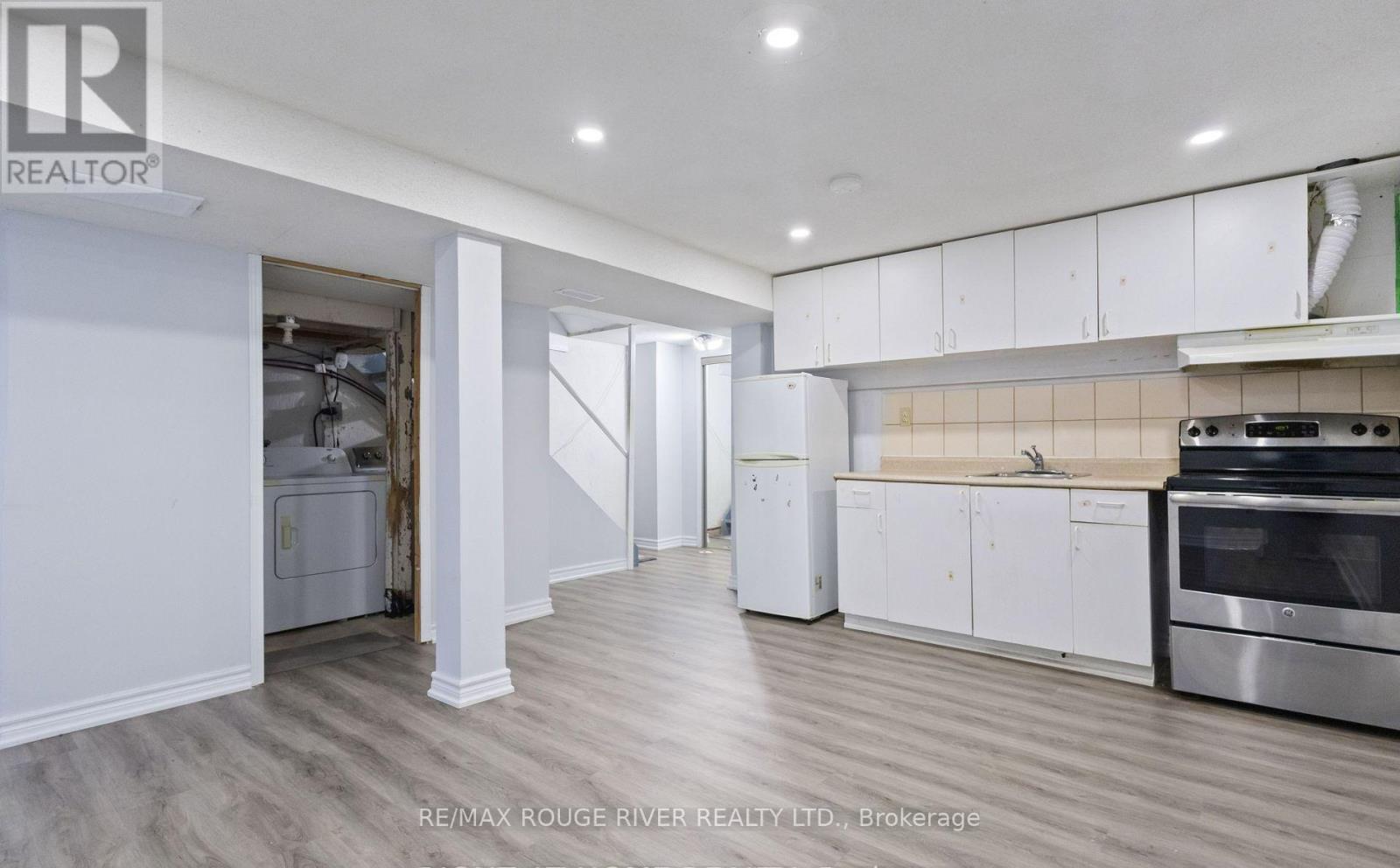 Rec Room and Kitchen - 77 Lowry Square, Toronto, ON - Indoor Photo Showing Kitchen
