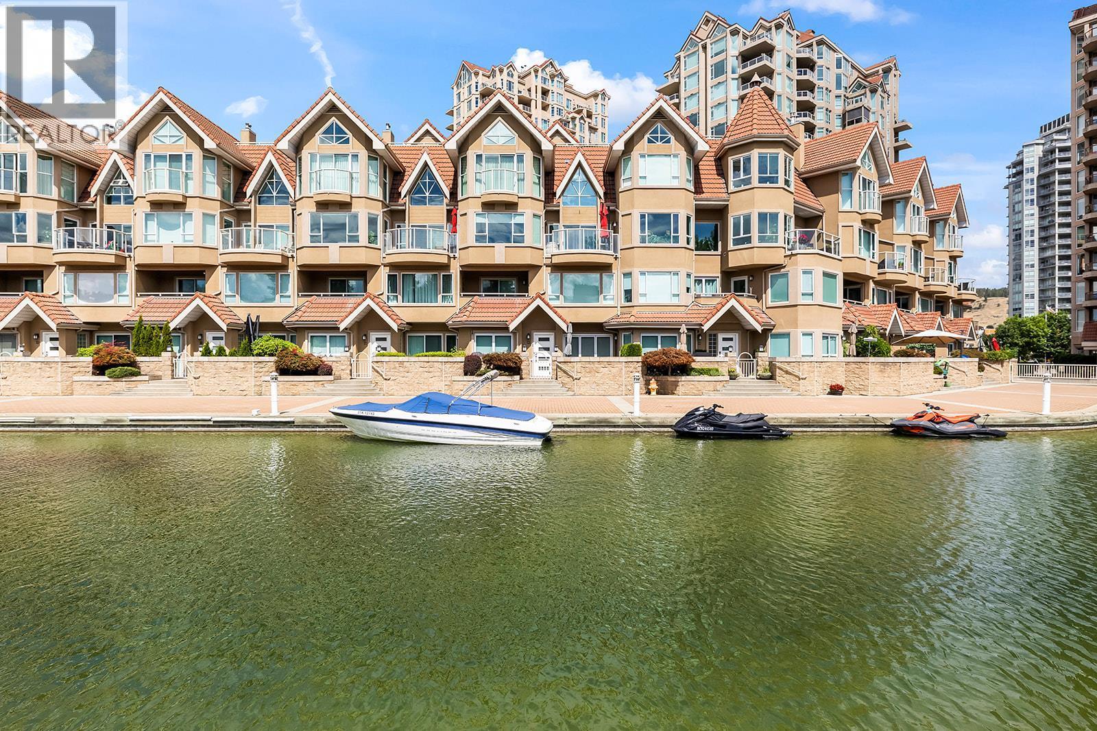 1156 Sunset Drive Unit# 123, Kelowna, BC - Outdoor With Body Of Water With Facade