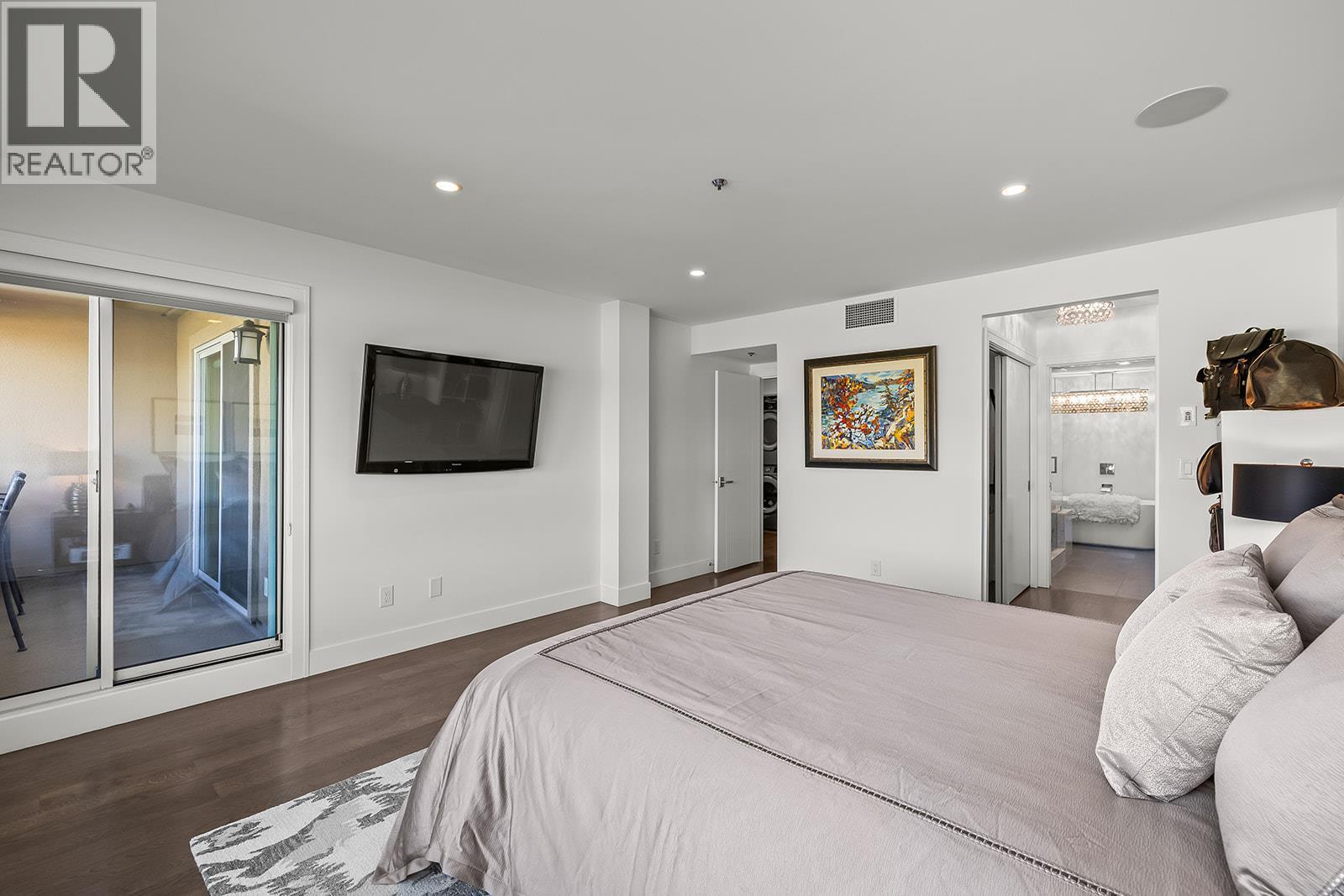 2nd floor deck - 1156 Sunset Drive Unit# 123, Kelowna, BC - Indoor Photo Showing Bedroom