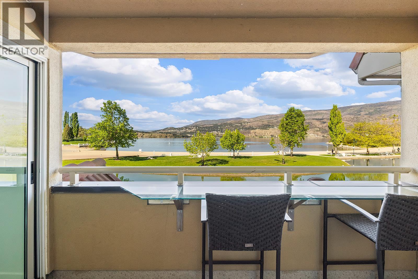 View from 2nd floor deck - 1156 Sunset Drive Unit# 123, Kelowna, BC - With Body Of Water With View