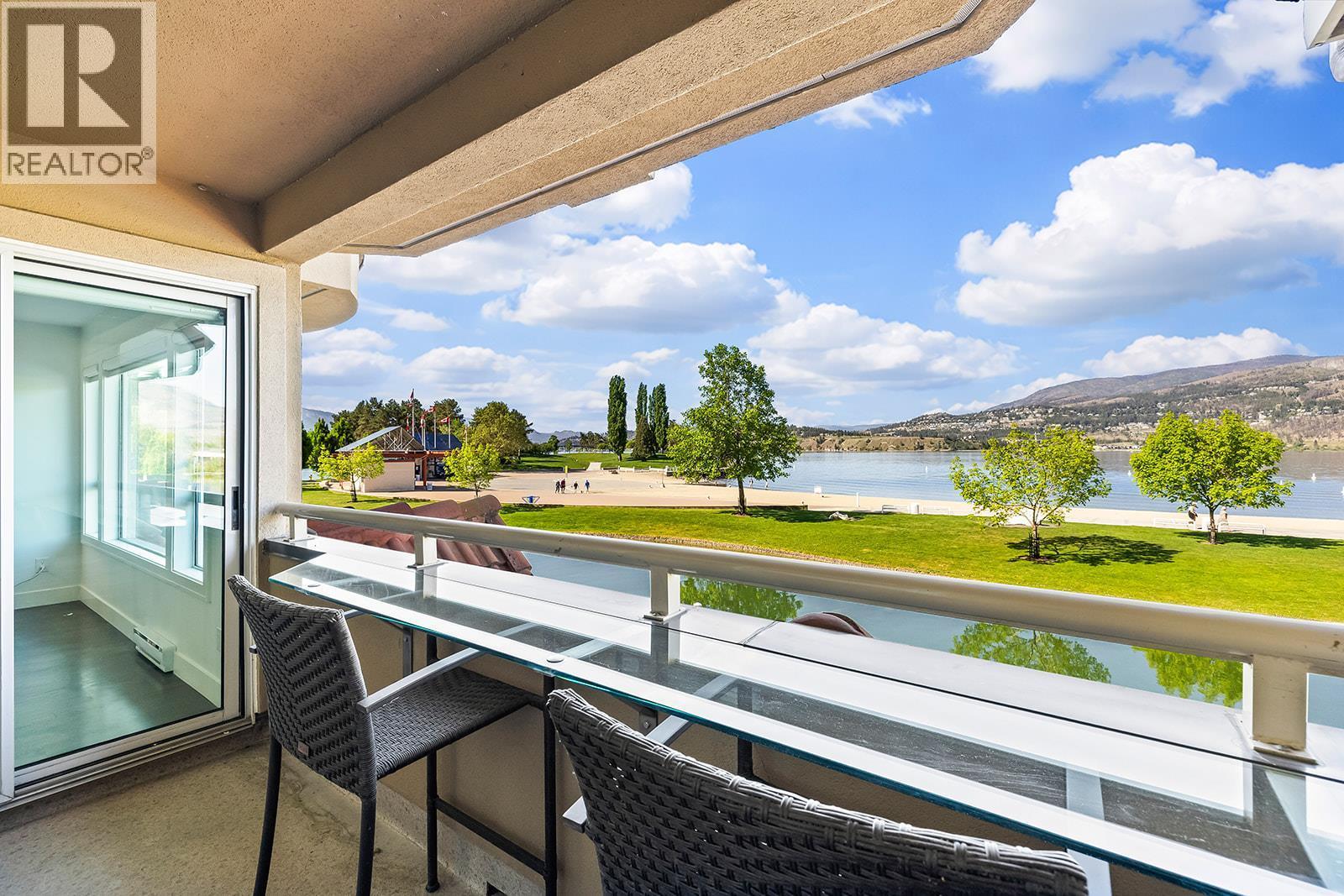 View from 2nd floor deck - 1156 Sunset Drive Unit# 123, Kelowna, BC - Outdoor With Body Of Water With View With Exterior