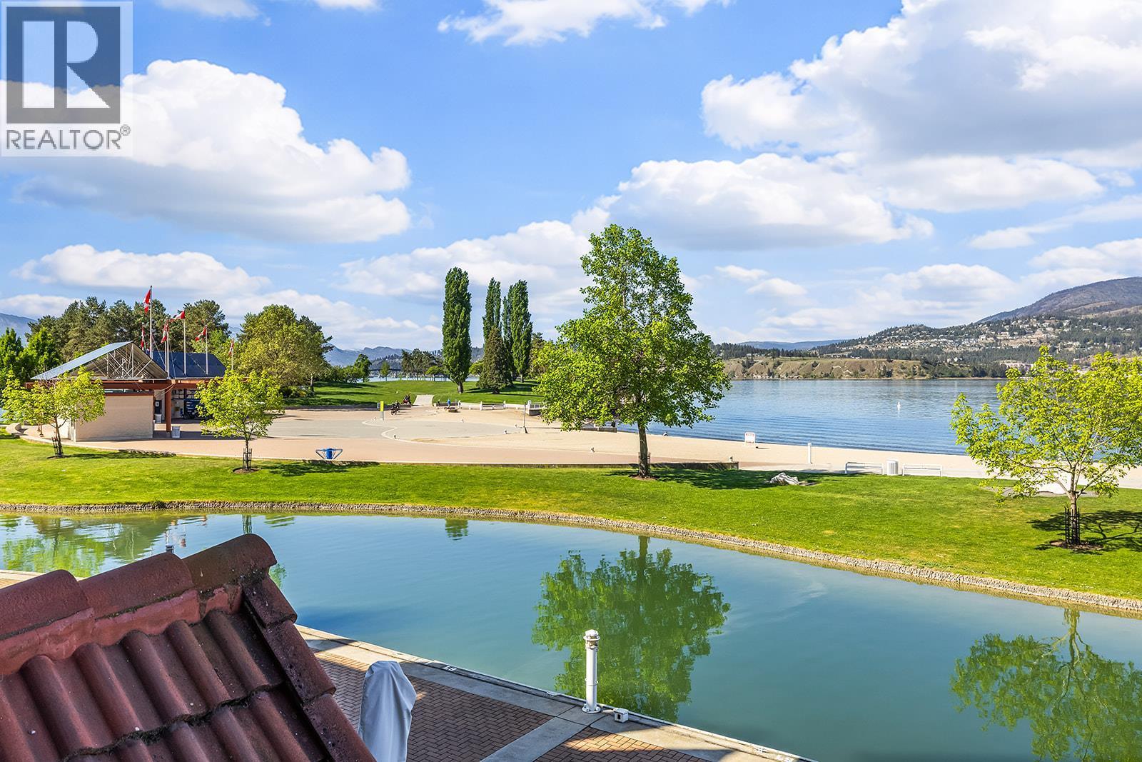 View from 2nd floor deck - 1156 Sunset Drive Unit# 123, Kelowna, BC - Outdoor With Body Of Water With View