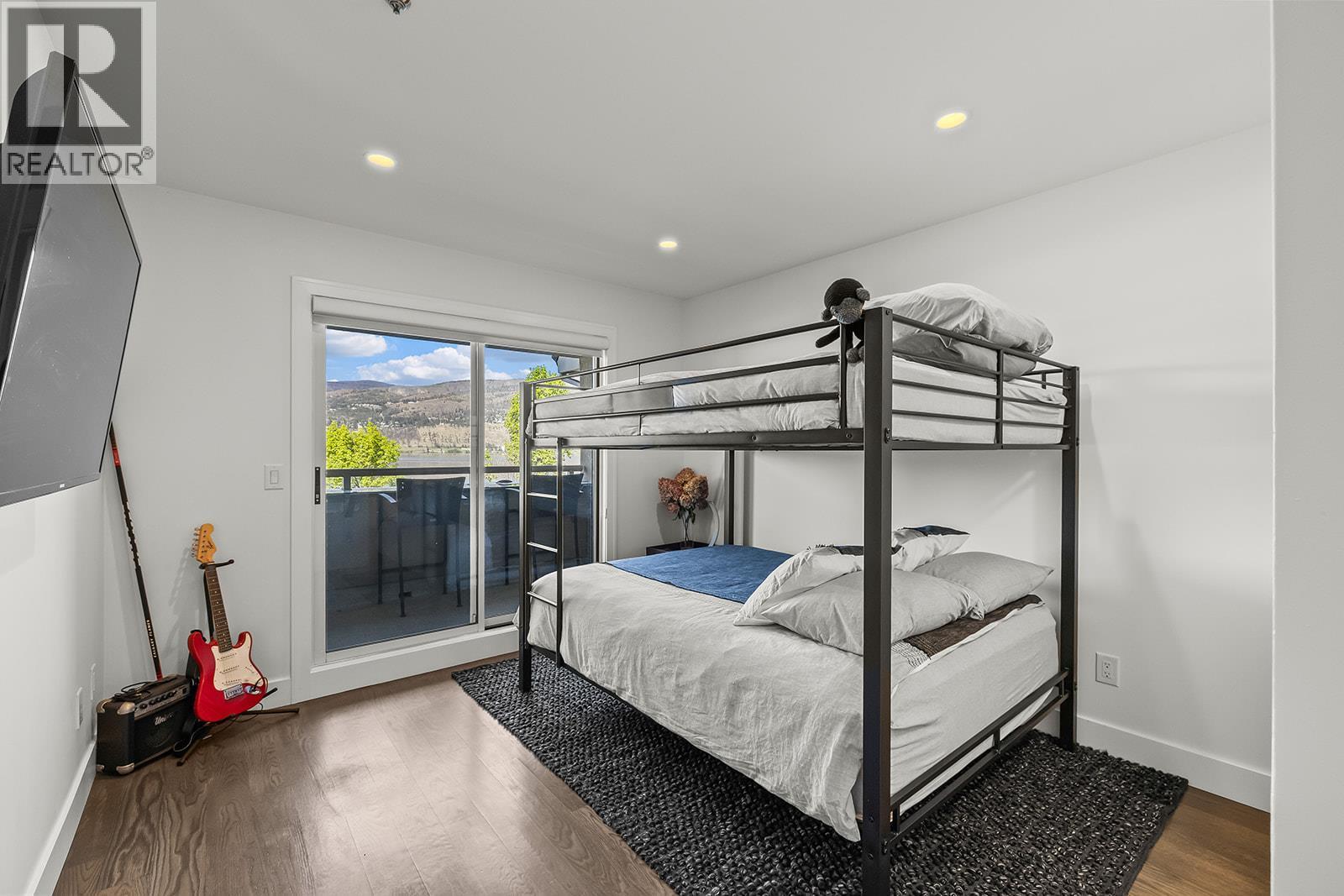 2nd floor bedroom - 1156 Sunset Drive Unit# 123, Kelowna, BC - Indoor Photo Showing Bedroom