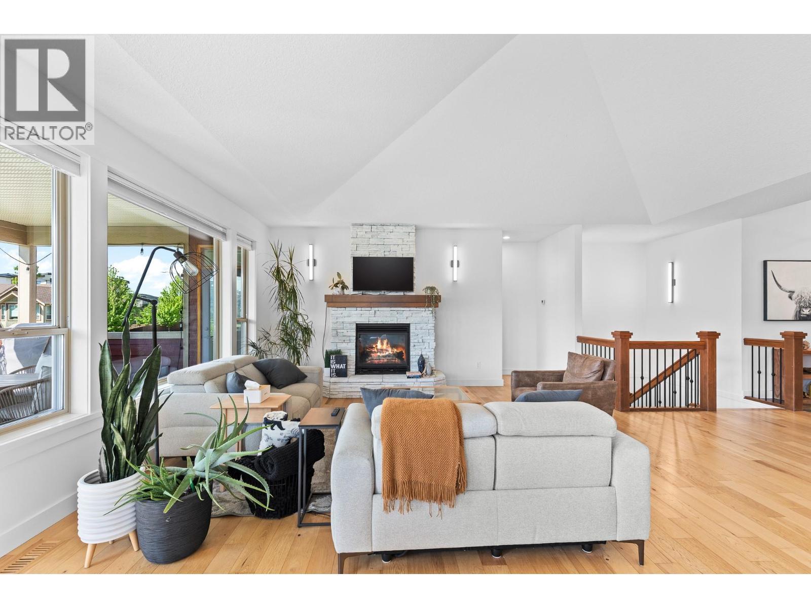514 Mt. Tanner Place, Coldstream, BC - Indoor Photo Showing Living Room With Fireplace
