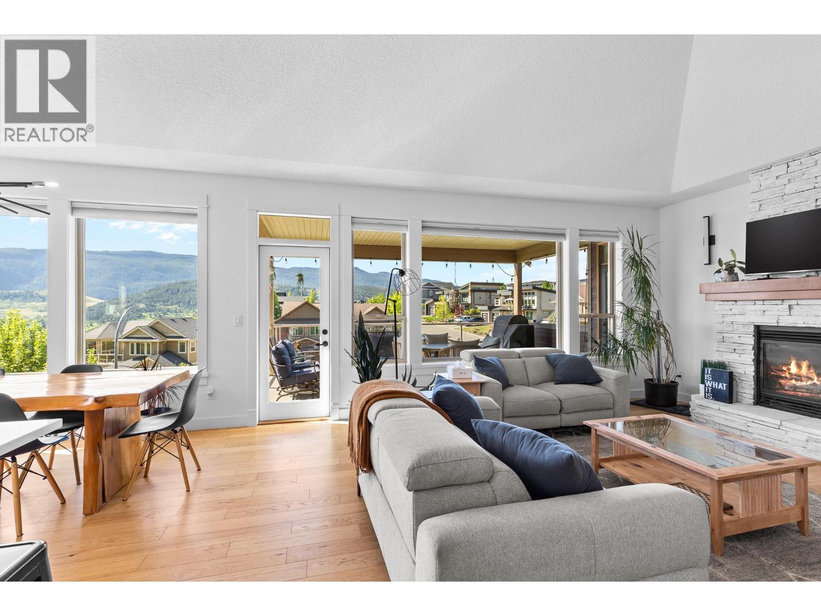 514 Mt. Tanner Place, Coldstream, BC - Indoor Photo Showing Living Room With Fireplace
