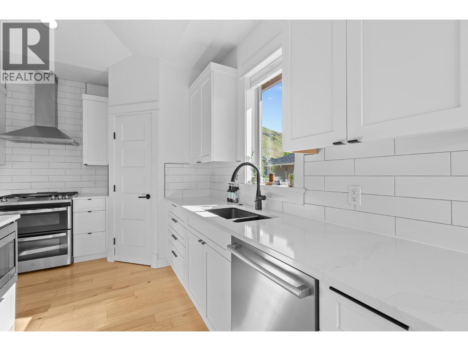 514 Mt. Tanner Place, Coldstream, BC - Indoor Photo Showing Kitchen With Double Sink With Upgraded Kitchen