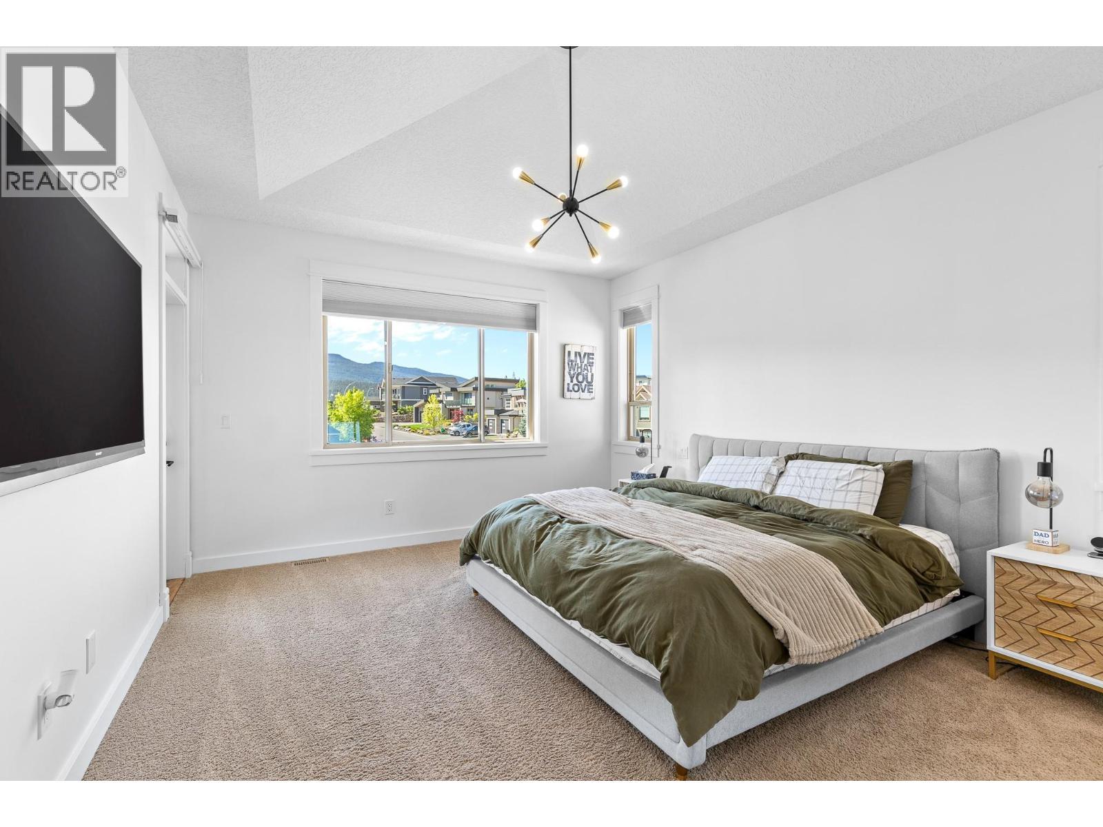 514 Mt. Tanner Place, Coldstream, BC - Indoor Photo Showing Bedroom