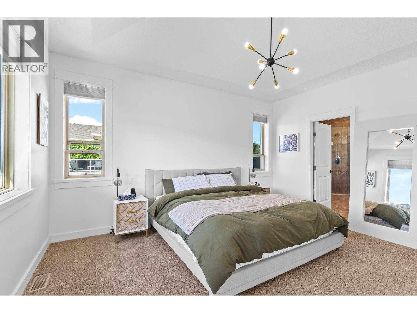 514 Mt. Tanner Place, Coldstream, BC - Indoor Photo Showing Bedroom