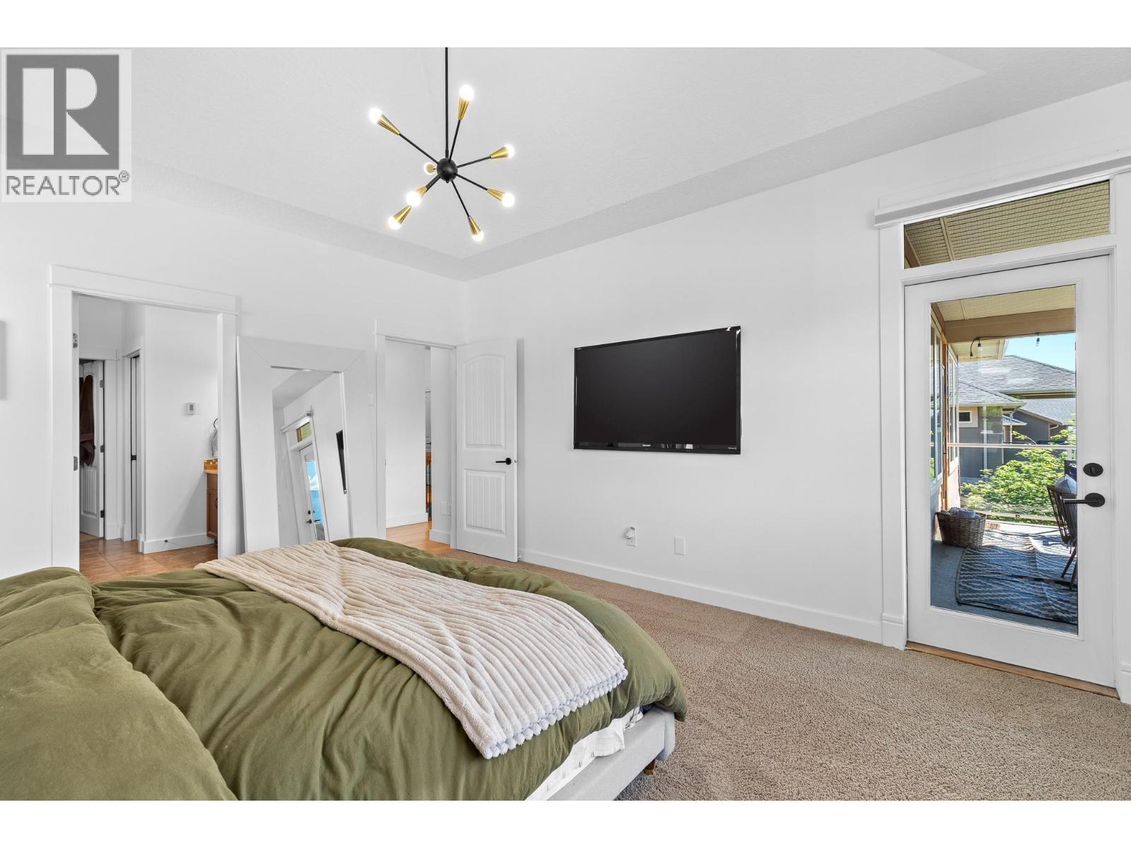 514 Mt. Tanner Place, Coldstream, BC - Indoor Photo Showing Bedroom