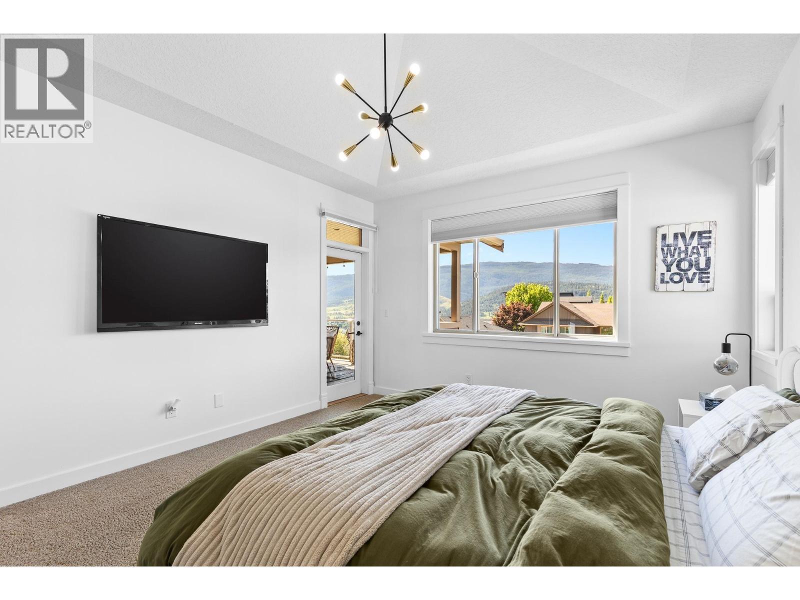 514 Mt. Tanner Place, Coldstream, BC - Indoor Photo Showing Bedroom