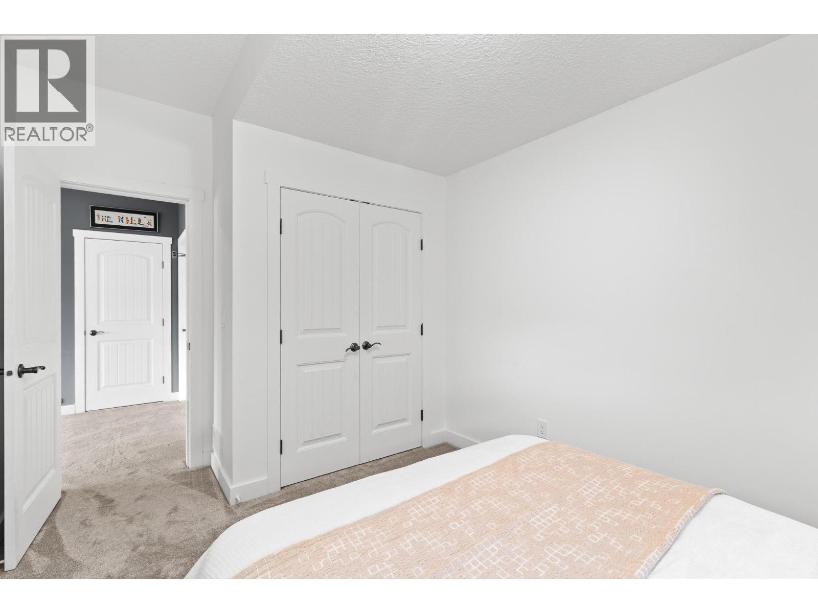 514 Mt. Tanner Place, Coldstream, BC - Indoor Photo Showing Bedroom