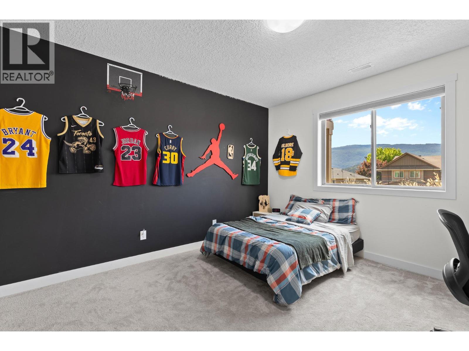 514 Mt. Tanner Place, Coldstream, BC - Indoor Photo Showing Bedroom