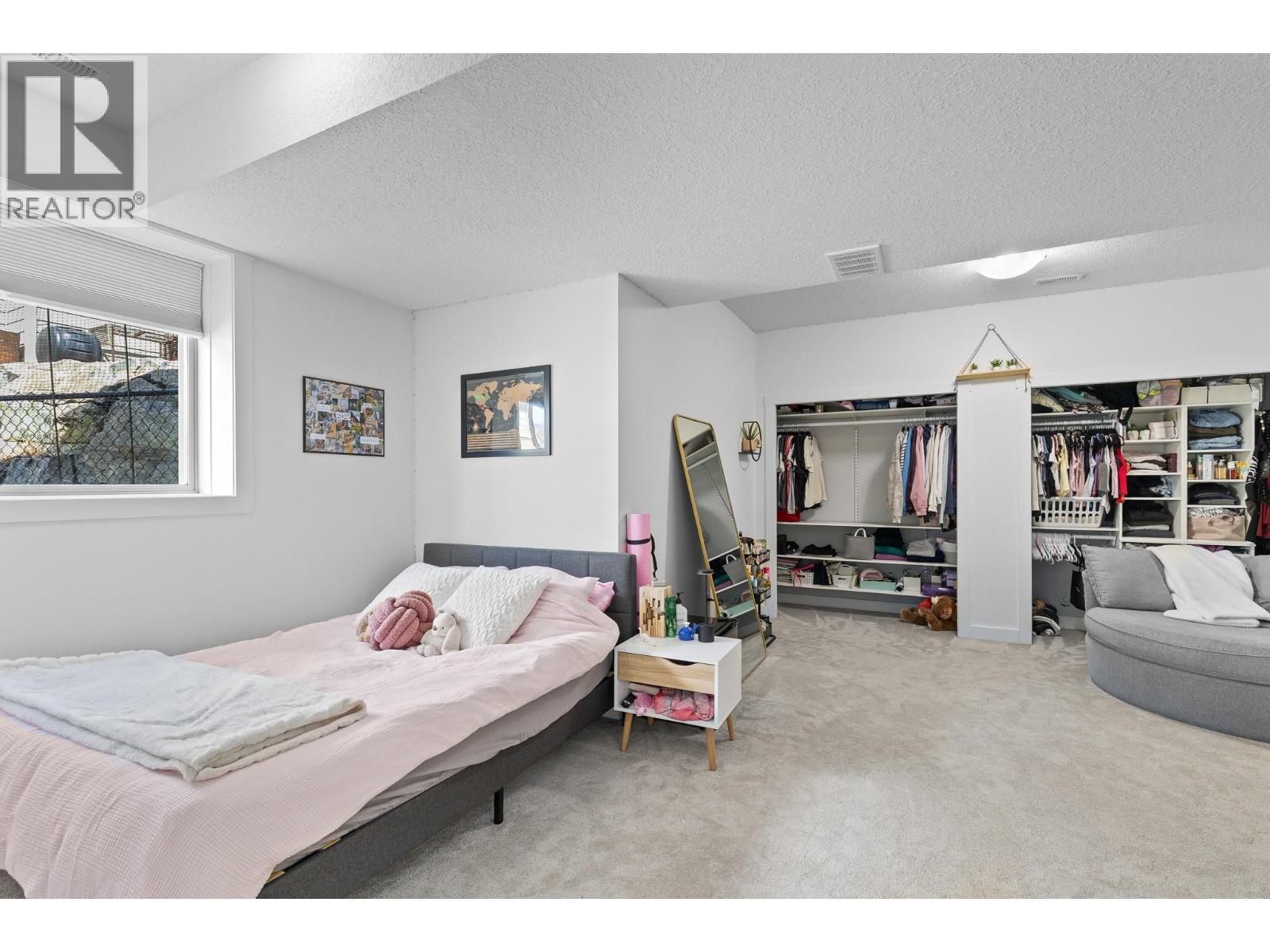 514 Mt. Tanner Place, Coldstream, BC - Indoor Photo Showing Bedroom